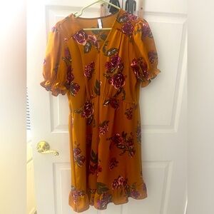 Beautiful golden dress with purple flowers